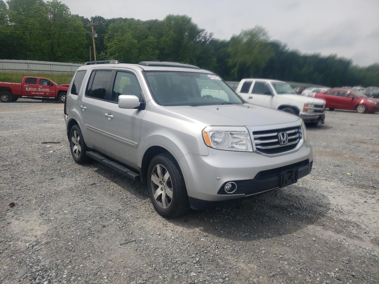 HONDA PILOT TOUR 2013 with VIN 5FNYF3H9XDB019099 - Photo from auction