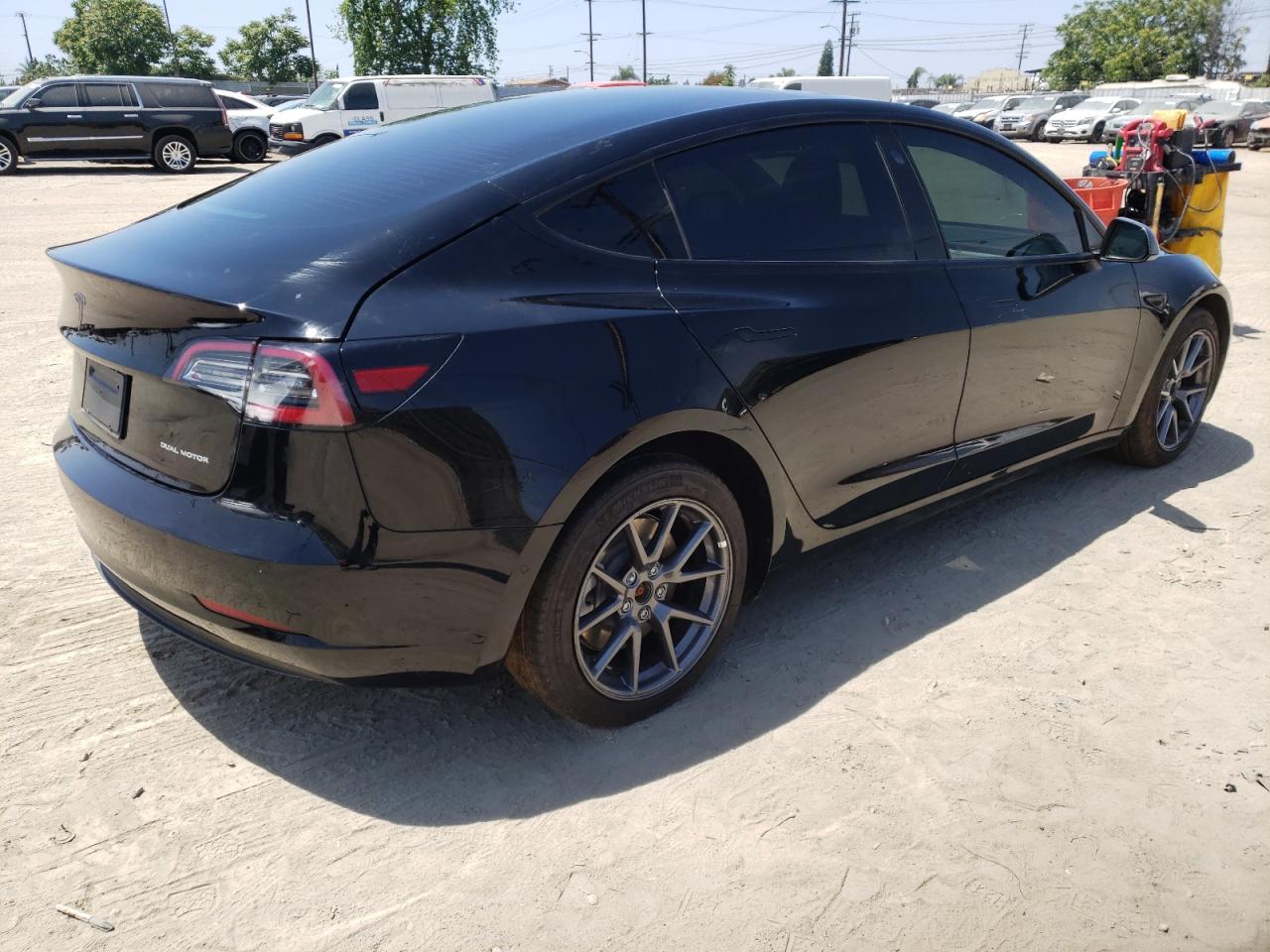 Photo 4 from auction – 2021 TESLA MODEL 3 with VIN 5YJ3E1EB2MF060268