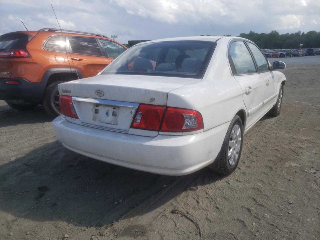 Photo 4 from auction – 2006 KIA OPTIMA LX with VIN KNAGD126665465904