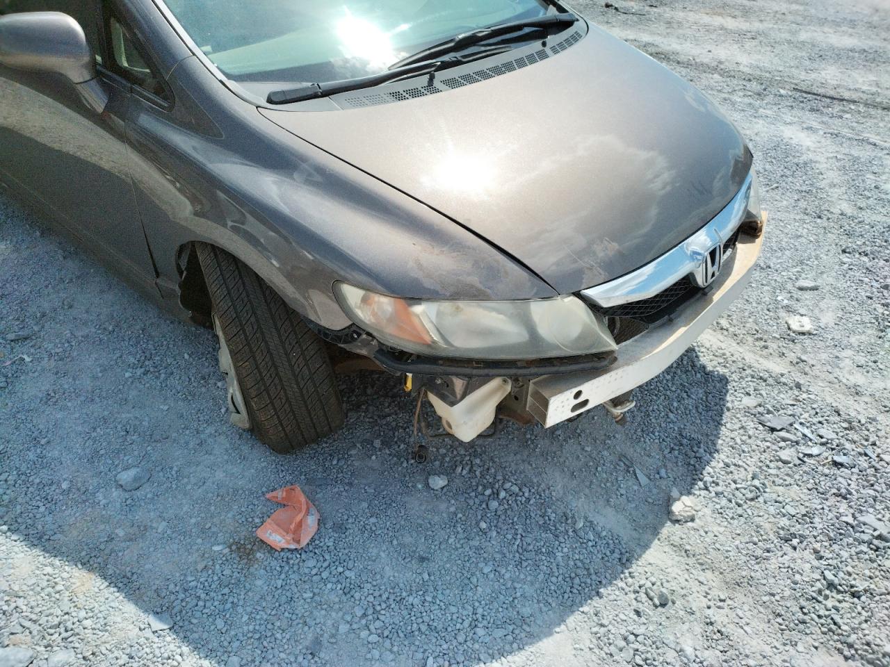 Photo 9 from auction – 2011 HONDA CIVIC LX with VIN 19XFA1F56BE048385