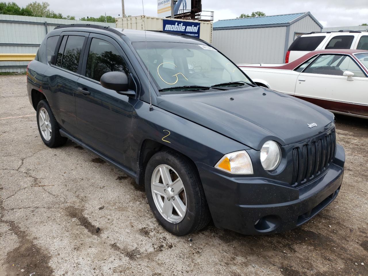 JEEP COMPASS 2007 with VIN 1J8FT47W87D206049 - Photo from auction
