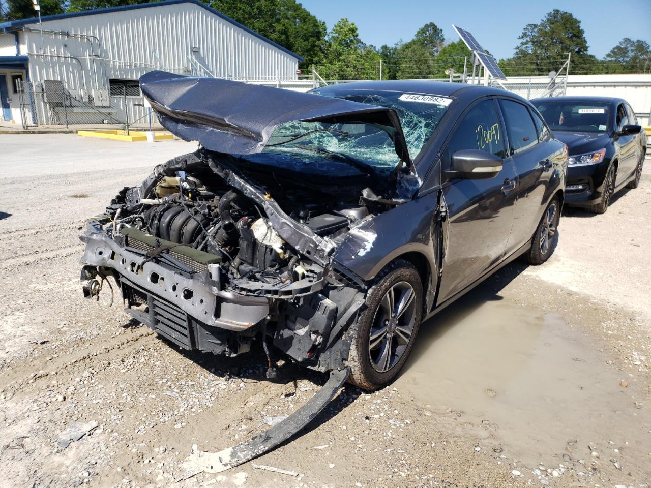 Photo 2 from auction – 2014 FORD FOCUS SE with VIN 1FADP3F25EL452013