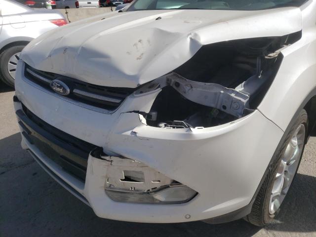 Photo 9 from auction – 2014 FORD ESCAPE TIT with VIN 1FMCU9J96EUA70441