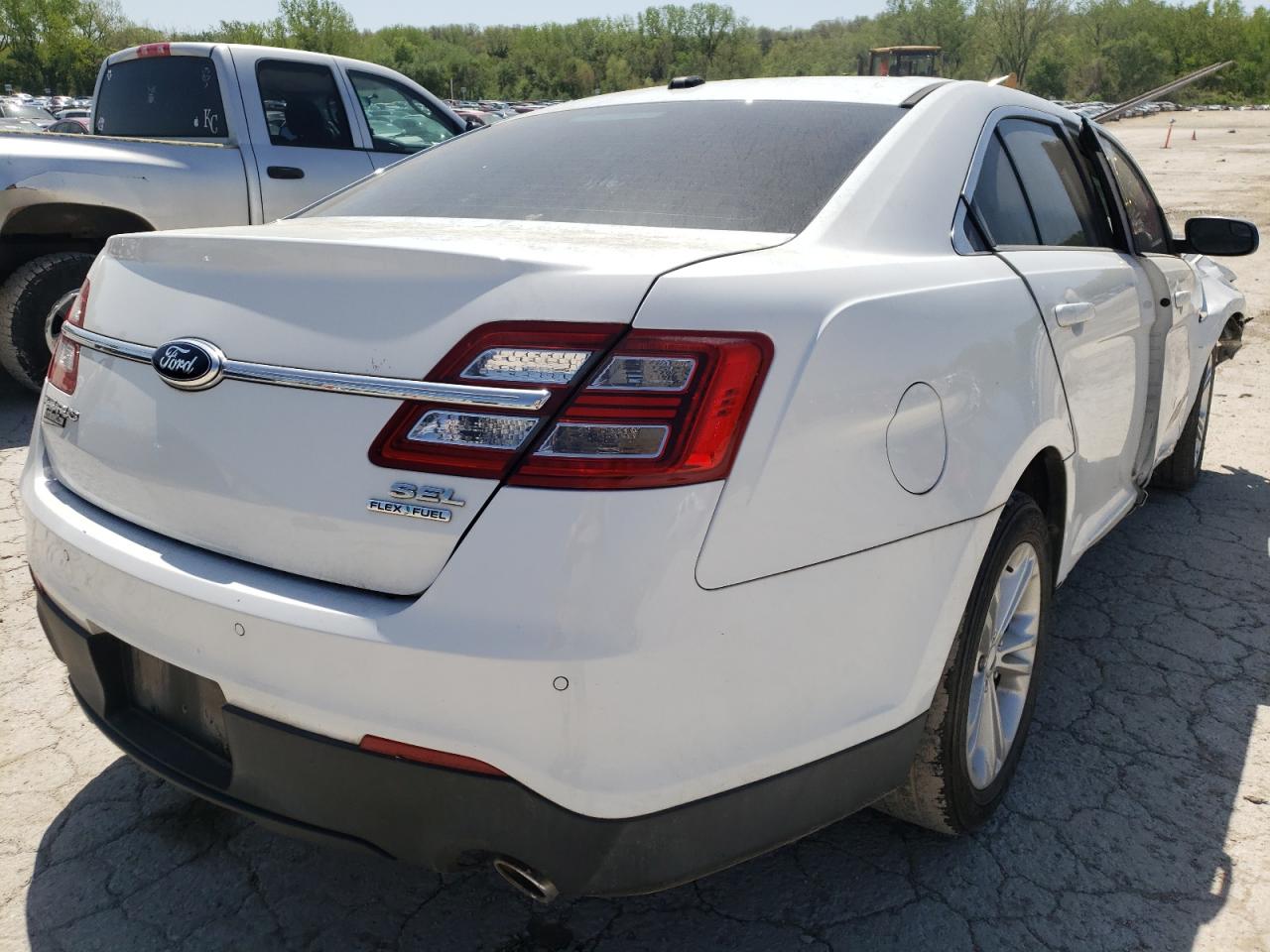 Photo 4 from auction – 2013 FORD TAURUS SEL with VIN 1FAHP2E88DG230199