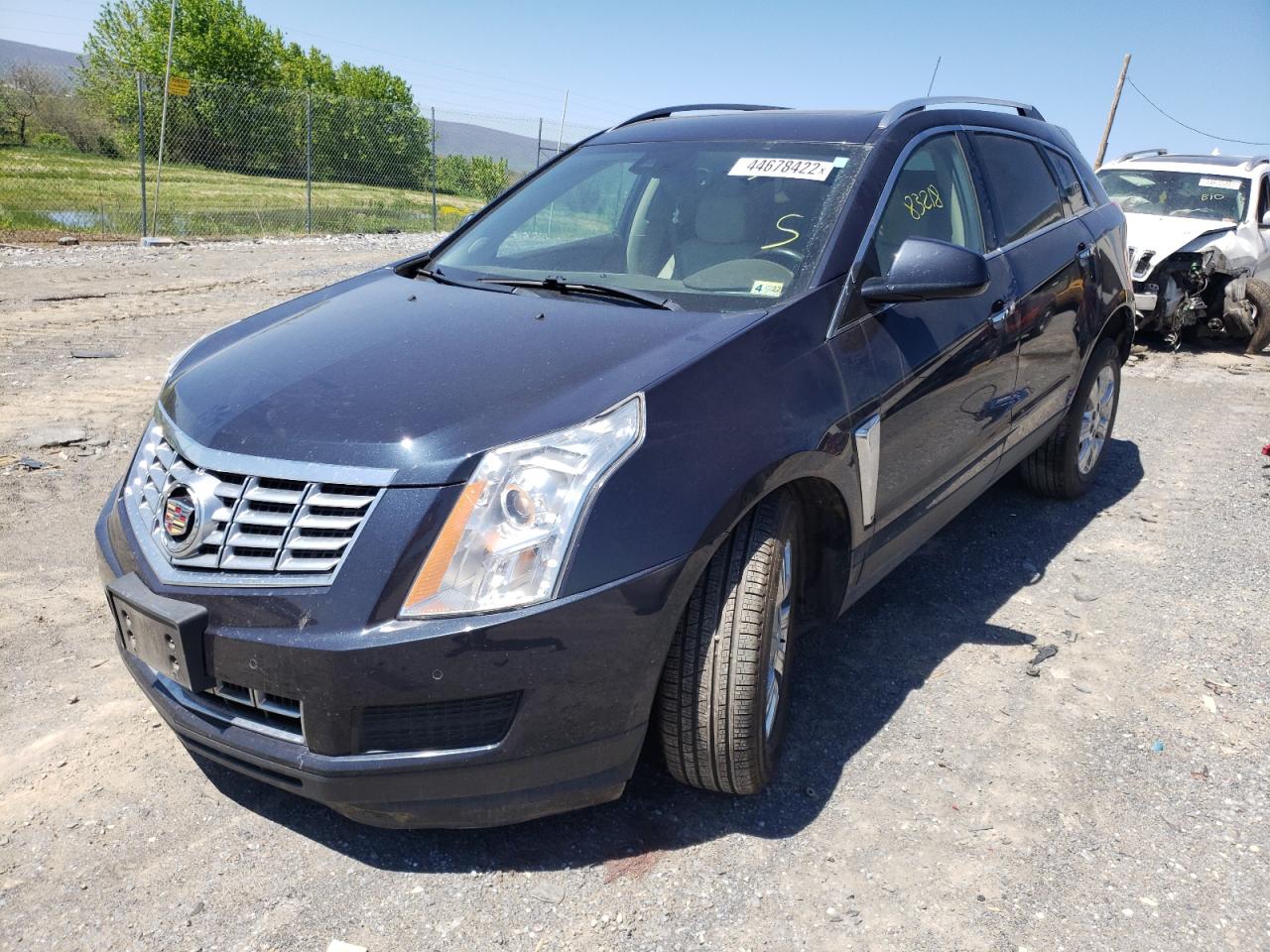 Photo 2 from auction – 2015 CADILLAC SRX LUXURY with VIN 3GYFNEE34FS630434