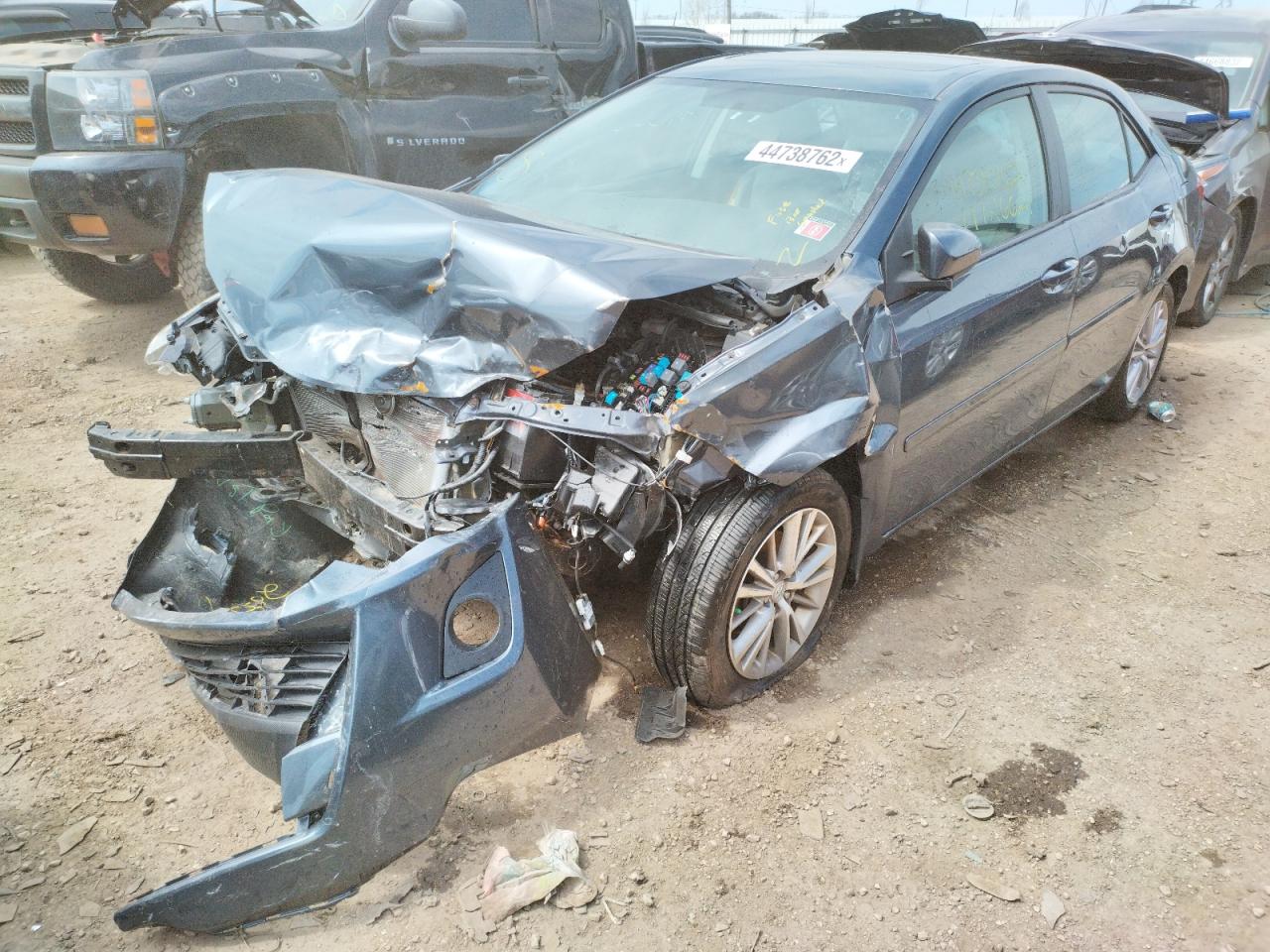Photo 2 from auction – 2014 TOYOTA COROLLA L with VIN 5YFBURHE1EP066698