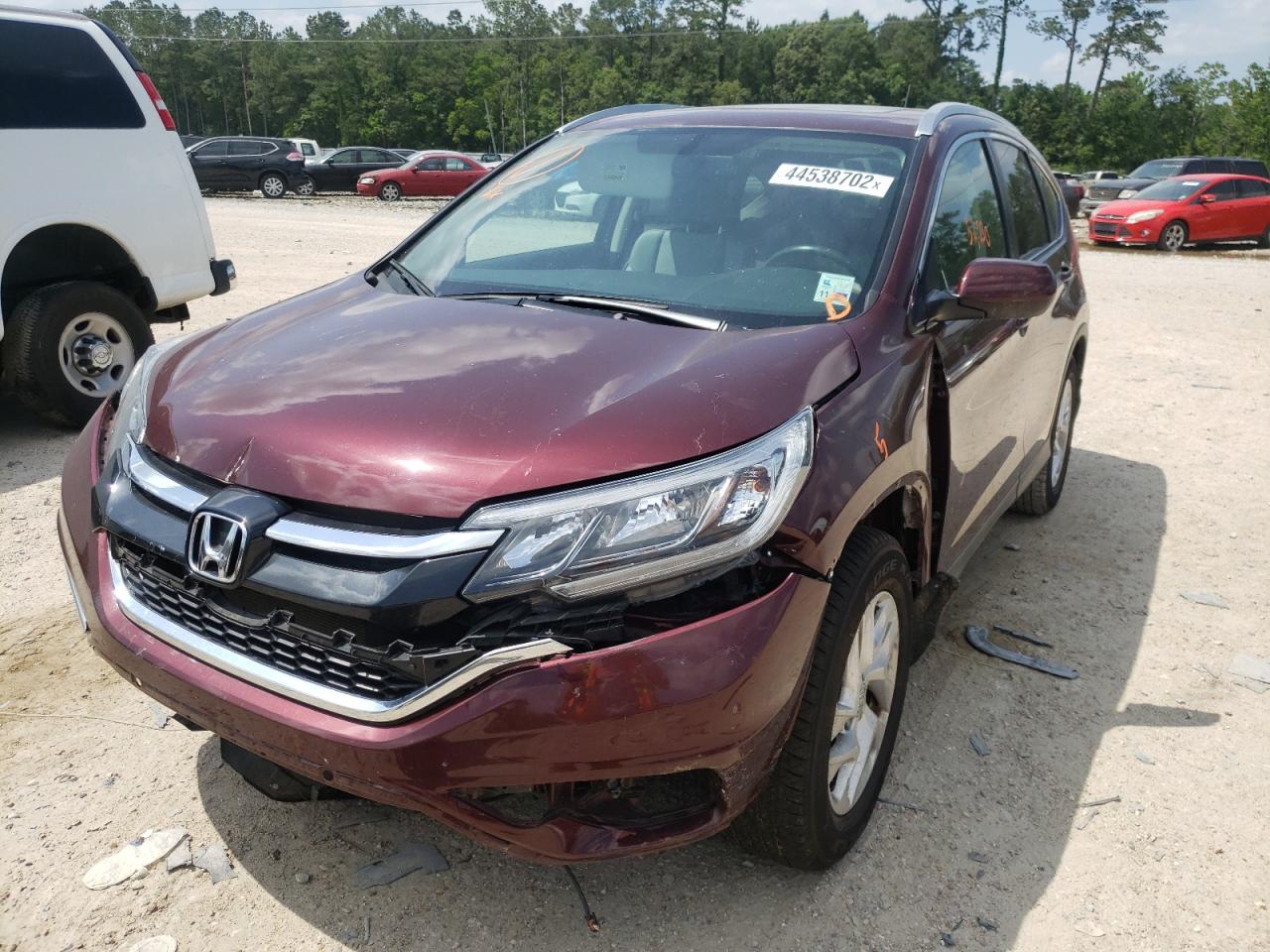 Photo 12 from auction – 2015 HONDA CR-V EXL with VIN 2HKRM3H74FH547458