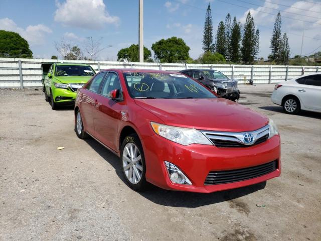 Photo 1 from auction – 2014 TOYOTA CAMRY HYBR with VIN 4T1BD1FK9EU104221