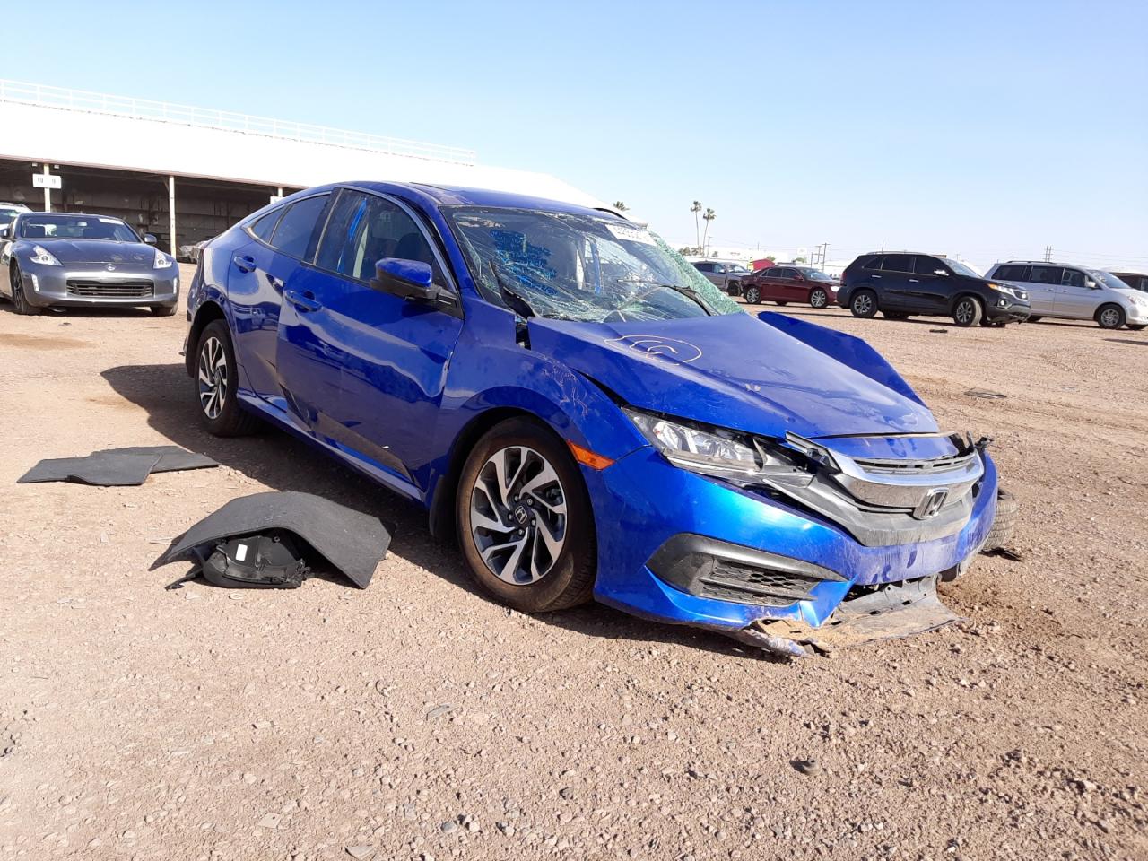 Photo 11 from auction – 2017 HONDA CIVIC EX with VIN 19XFC2F74HE082464