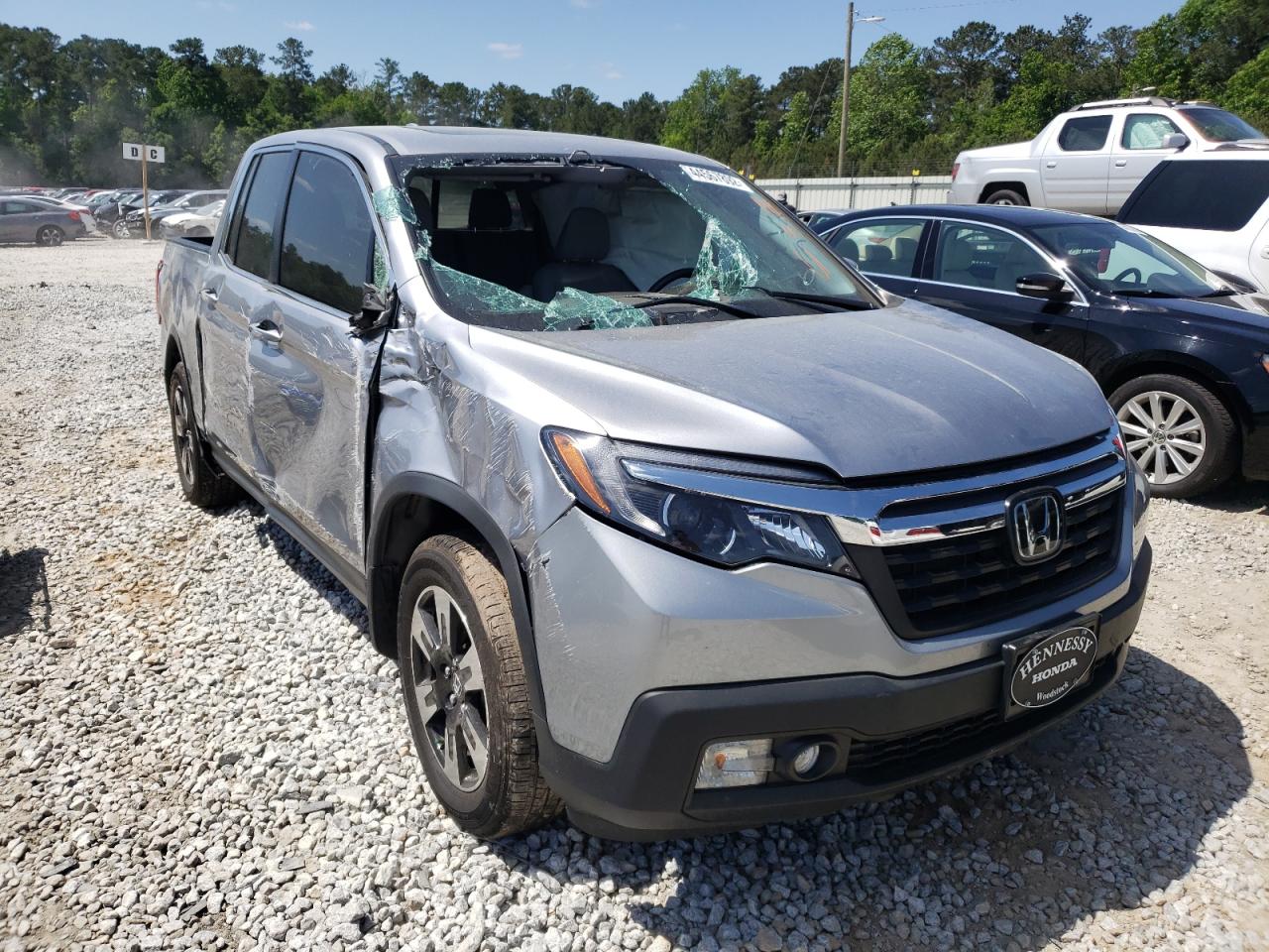 HONDA RIDGELINE 2020 with VIN 5FPYK3F57LB013245 - Photo from auction