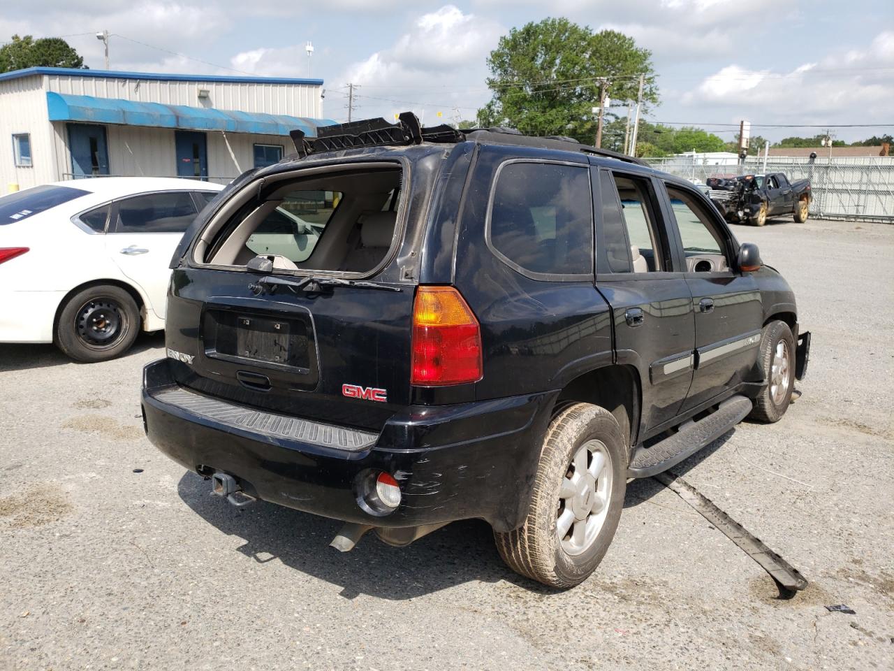 Photo 4 from auction – 2005 GMC ENVOY with VIN 1GKDS13S852317099