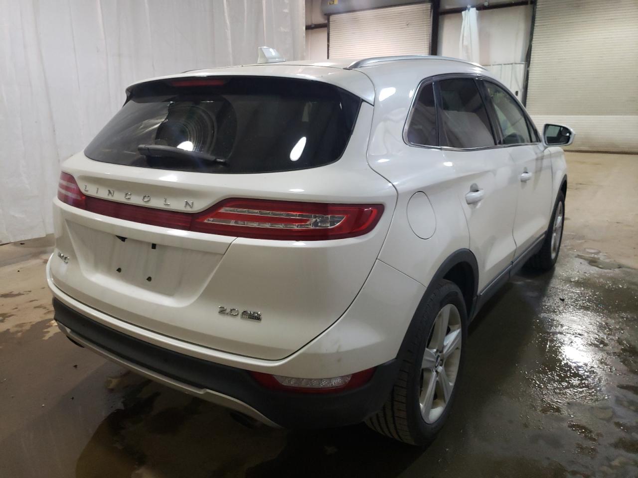 Photo 4 from auction – 2015 LINCOLN MKC with VIN 5LMCJ2A98FUJ24496