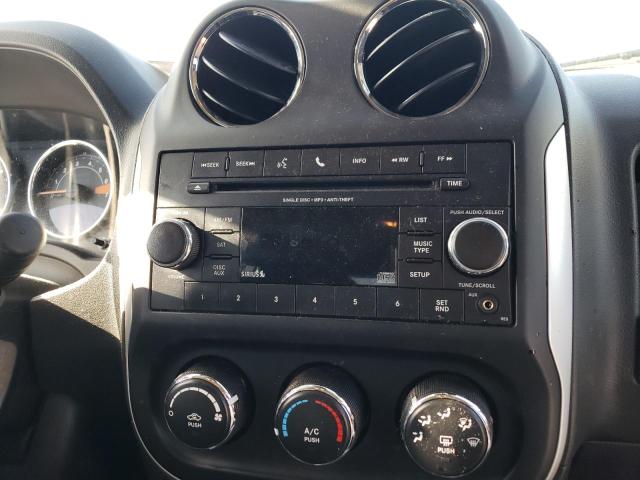 Photo 9 from auction – 2014 JEEP COMPASS LA with VIN 1C4NJCEB8ED662357
