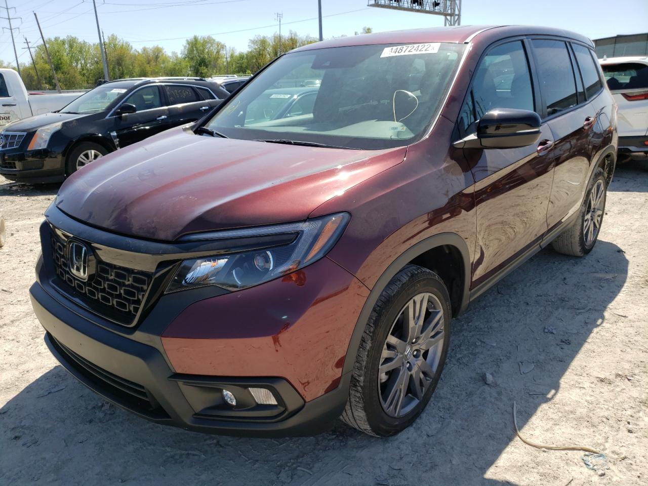 Photo 2 from auction – 2019 HONDA PASSPORT E with VIN 5FNYF8H50KB014582