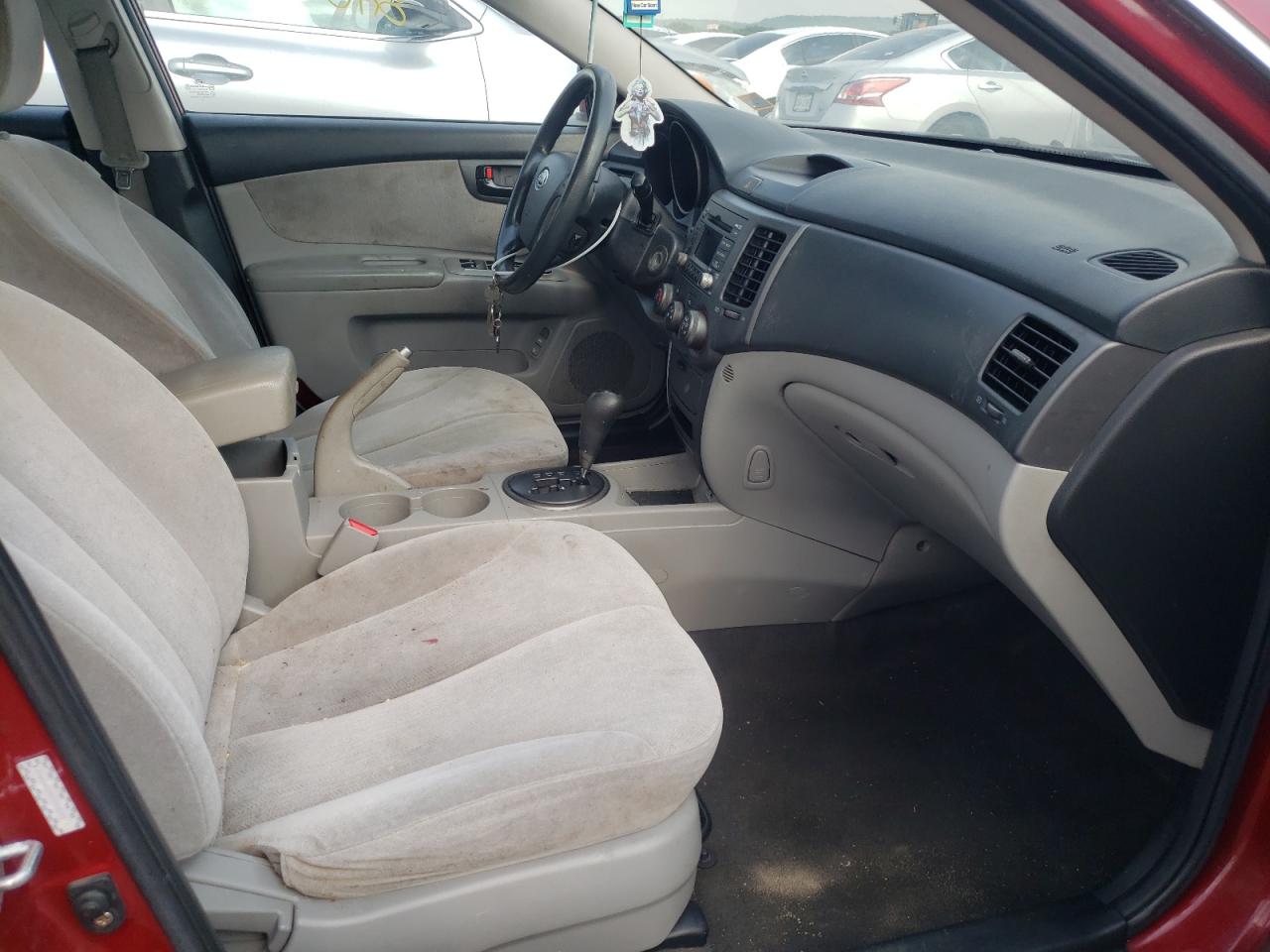 Photo 5 from auction – 2009 KIA OPTIMA LX with VIN KNAGE228295322571