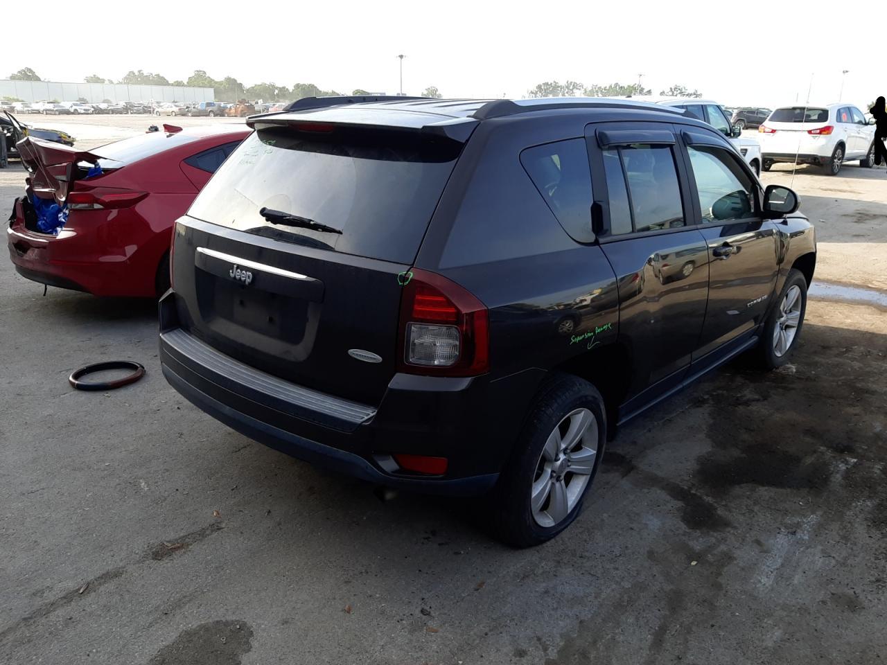 Photo 4 from auction – 2014 JEEP COMPASS LA with VIN 1C4NJCEBXED586897