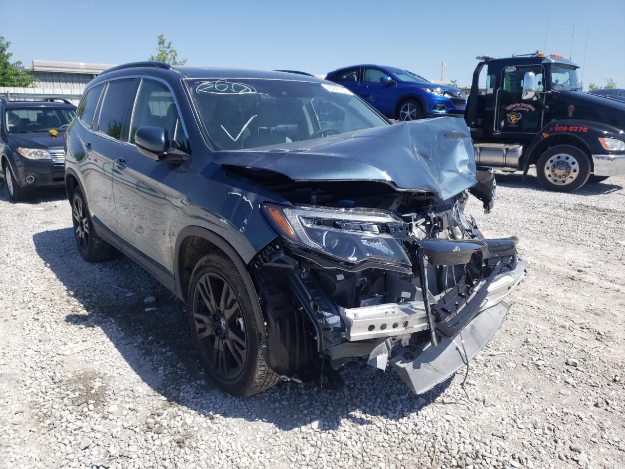 Photo 1 from auction – 2021 HONDA PILOT SE with VIN 5FNYF6H21MB101632