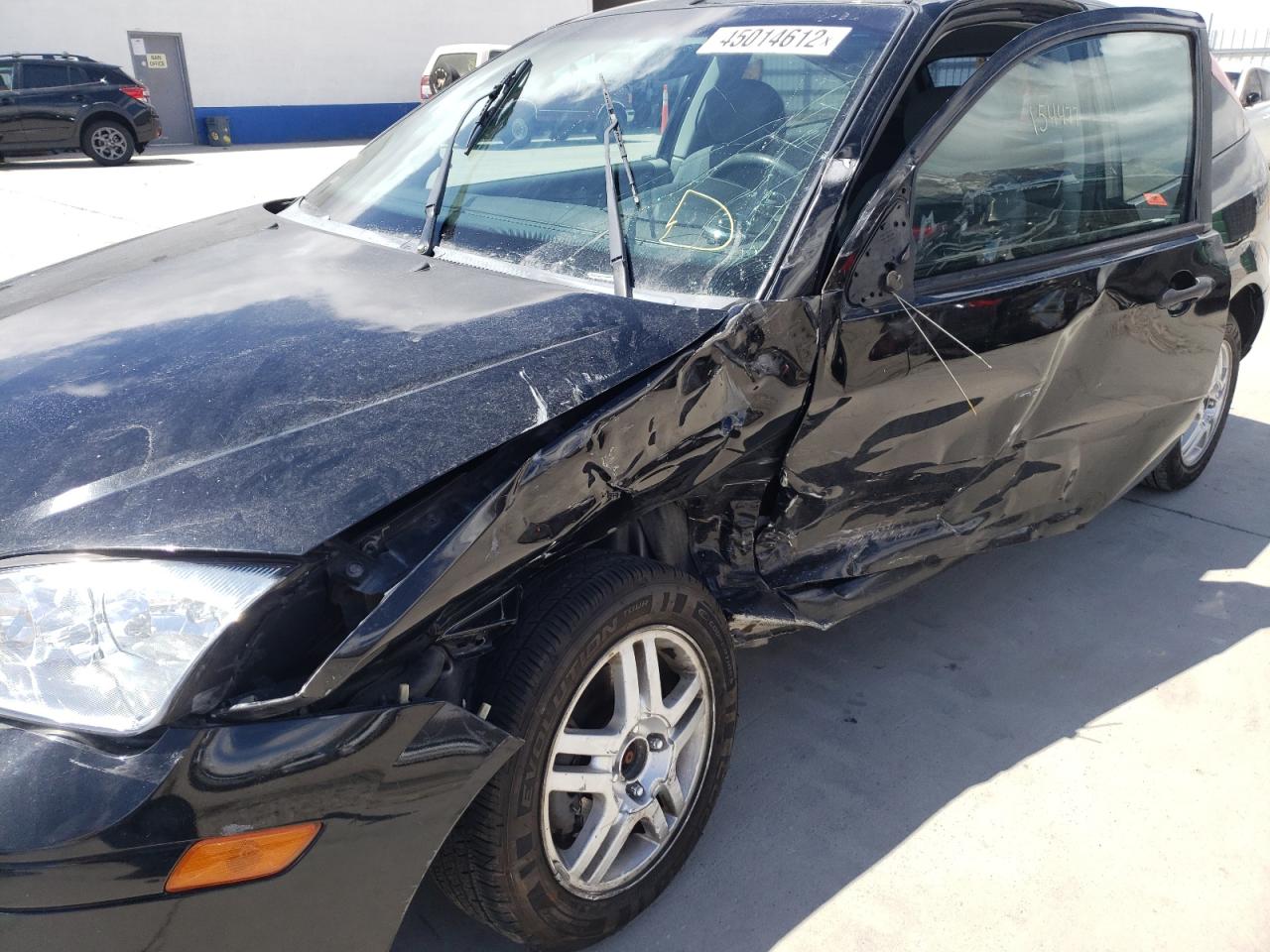 Photo 9 from auction – 2005 FORD FOCUS ZX3 with VIN 3FAFP31N75R150699