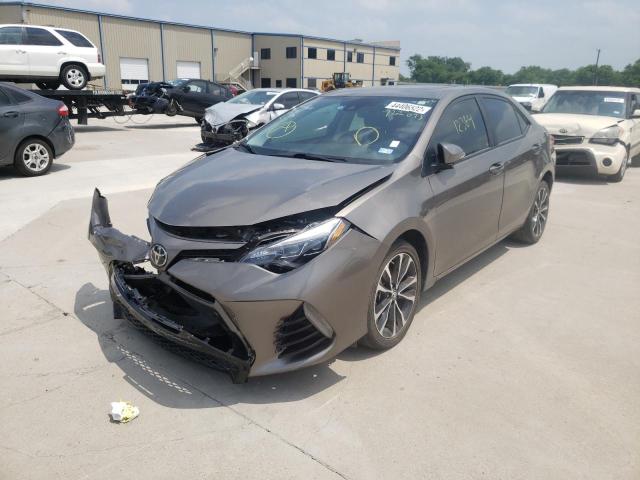 Photo 2 from auction – 2017 TOYOTA COROLLA L with VIN 5YFBURHE4HP722073
