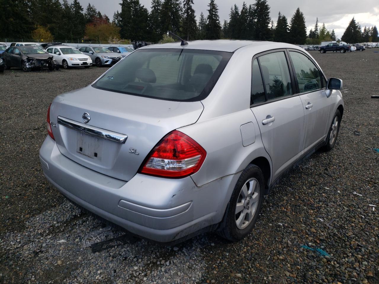 Photo 4 from auction – 2009 NISSAN VERSA S with VIN 3N1BC11E79L424603