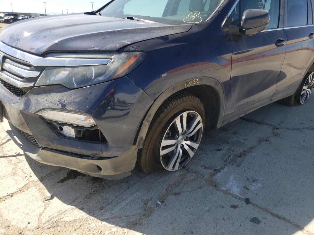 Photo 9 from auction – 2016 HONDA PILOT EXL with VIN 5FNYF6H57GB087587