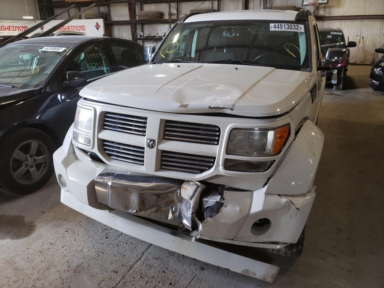 Photo 9 from auction – 2010 DODGE NITRO SXT with VIN 1D4PU5GK9AW118427
