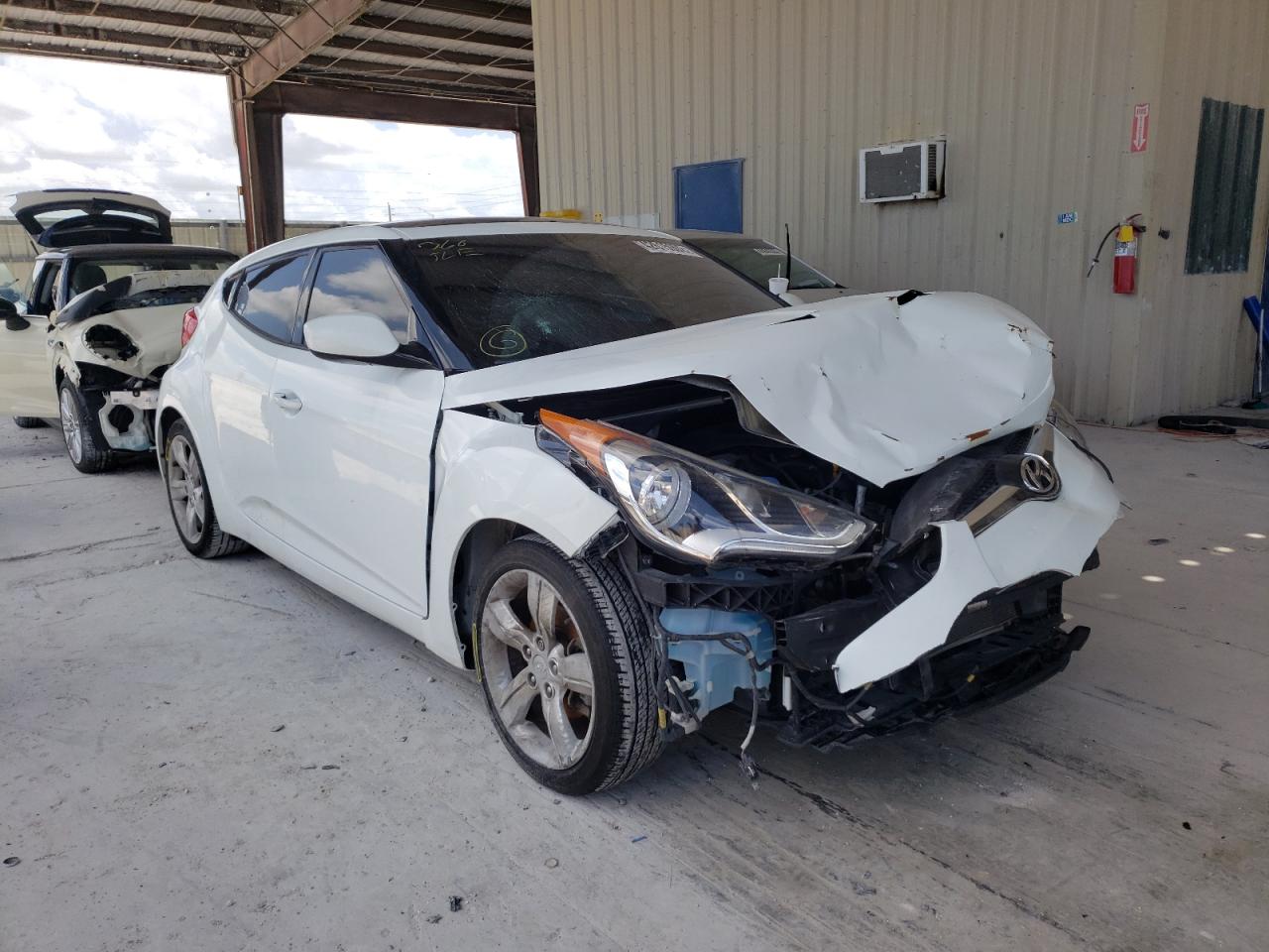 HYUNDAI VELOSTER 2014 with VIN KMHTC6AD4EU215384 - Photo from auction