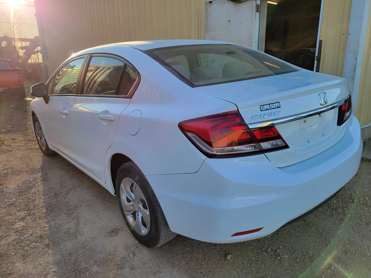 Photo 3 from auction – 2013 HONDA CIVIC LX with VIN 19XFB2F53DE076344
