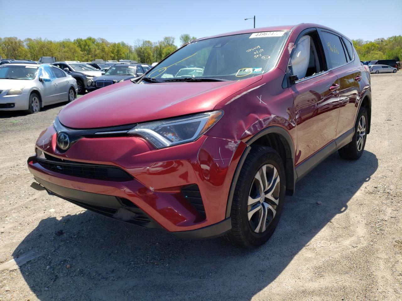 Photo 2 from auction – 2018 TOYOTA RAV4 LE with VIN JTMBFREV7JD228653