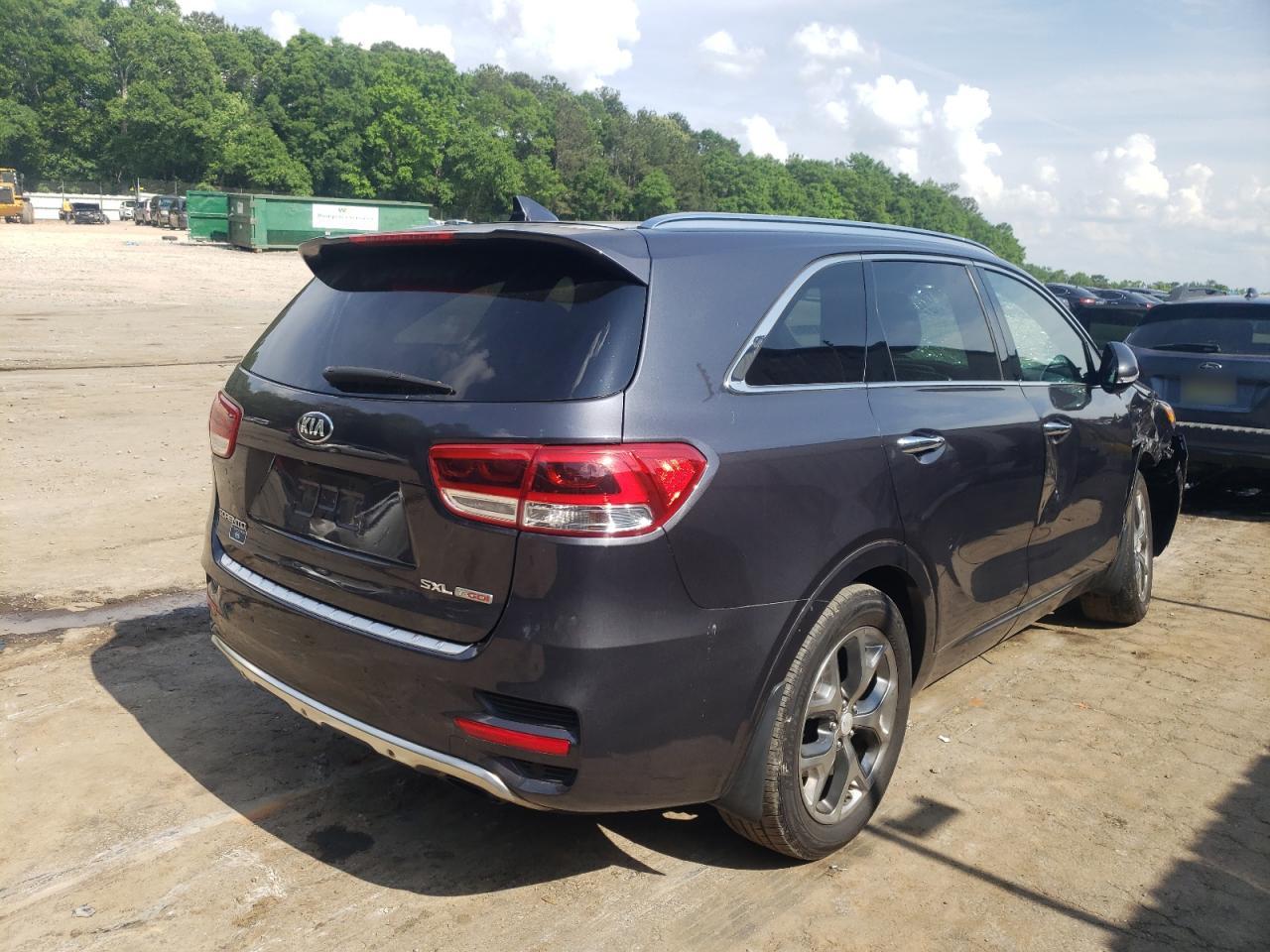 Photo 4 from auction – 2016 KIA SORENTO SX with VIN 5XYPK4A1XGG103373