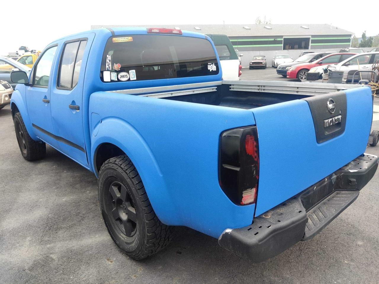 Photo 3 from auction – 2005 NISSAN FRONTIER C with VIN 1N6AD07W85C410633