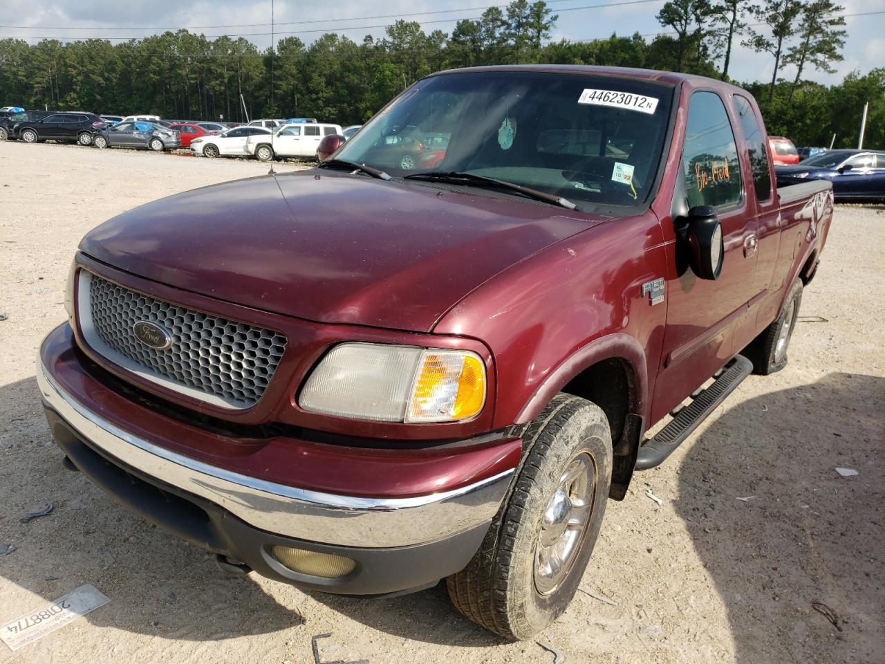 Photo 2 from auction – 1999 FORD F150 with VIN 1FTRX18L4XKB95980