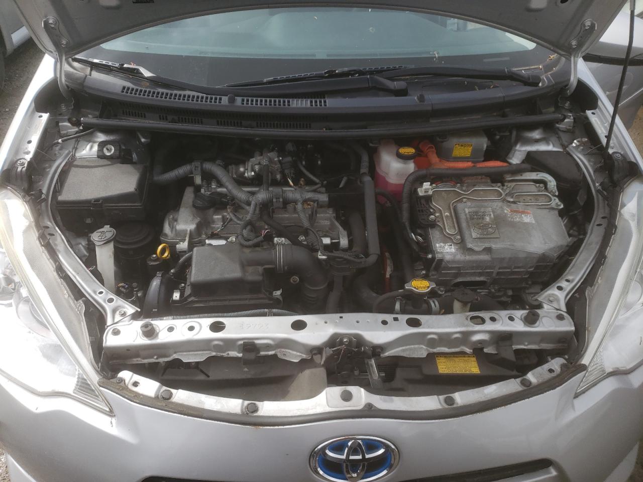 Photo 7 from auction – 2014 TOYOTA PRIUS C with VIN JTDKDTB34E1067272