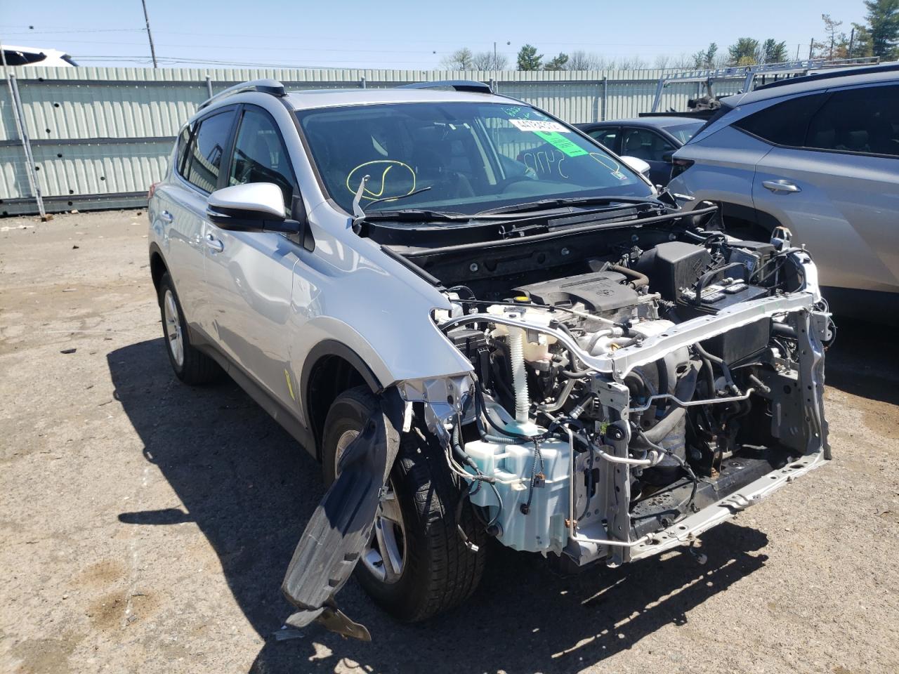 Photo 1 from auction – 2014 TOYOTA RAV4 XLE with VIN JTMRFREV9ED049518