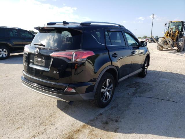 Photo 4 from auction – 2016 TOYOTA RAV4 XLE with VIN 2T3WFREV2GW285596