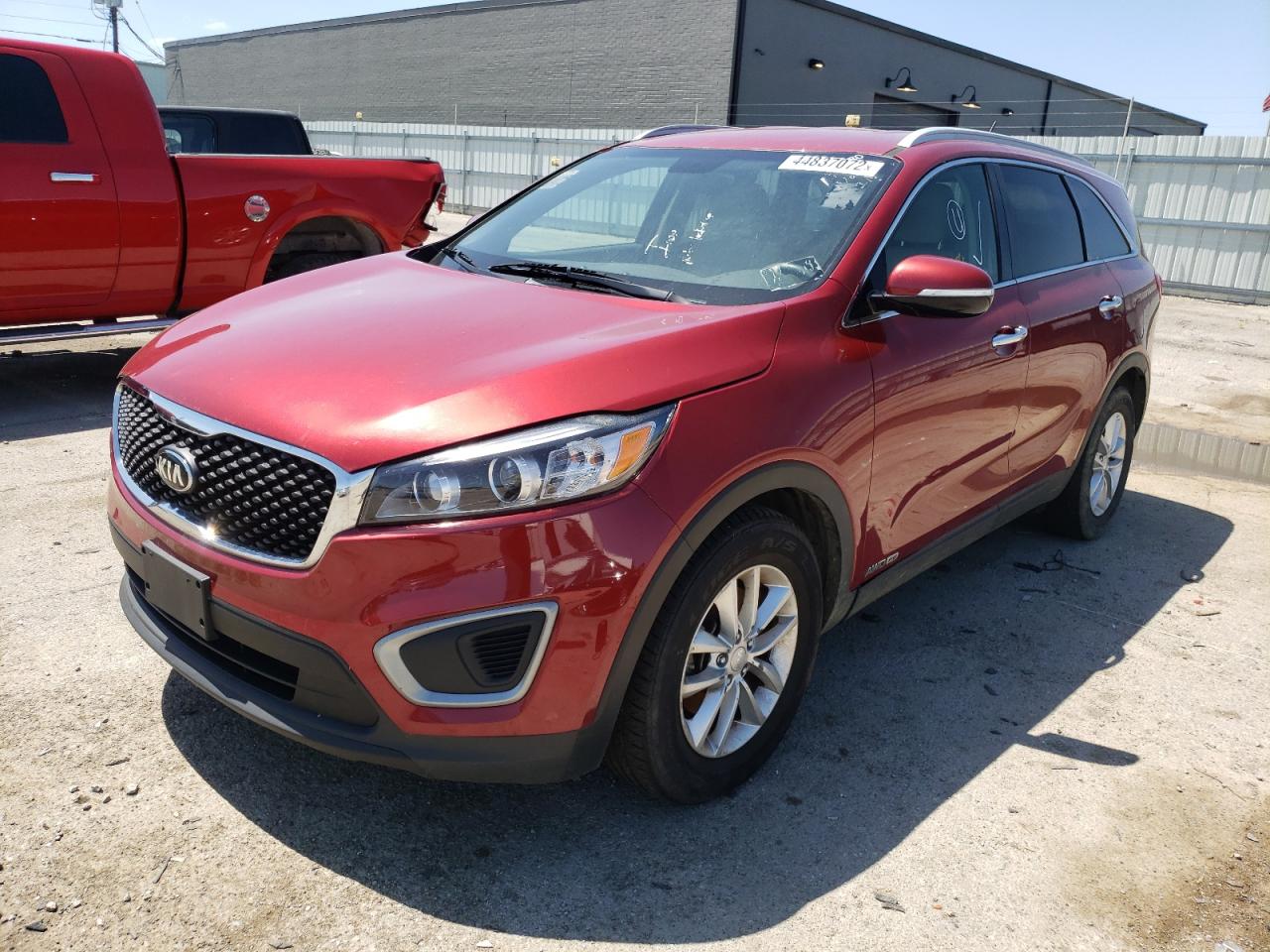 Photo 2 from auction – 2016 KIA SORENTO LX with VIN 5XYPGDA59GG134652