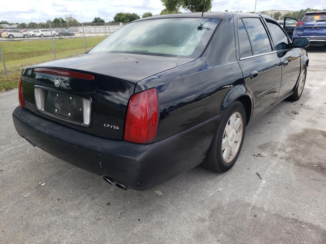 Photo 4 from auction – 2003 CADILLAC DEVILLE DT with VIN 1G6KF54973U145291