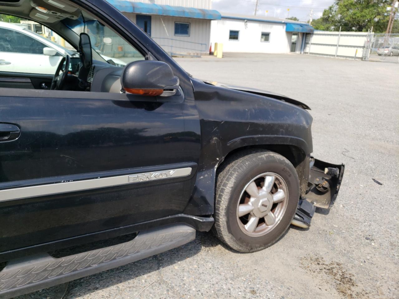 Photo 9 from auction – 2005 GMC ENVOY with VIN 1GKDS13S852317099