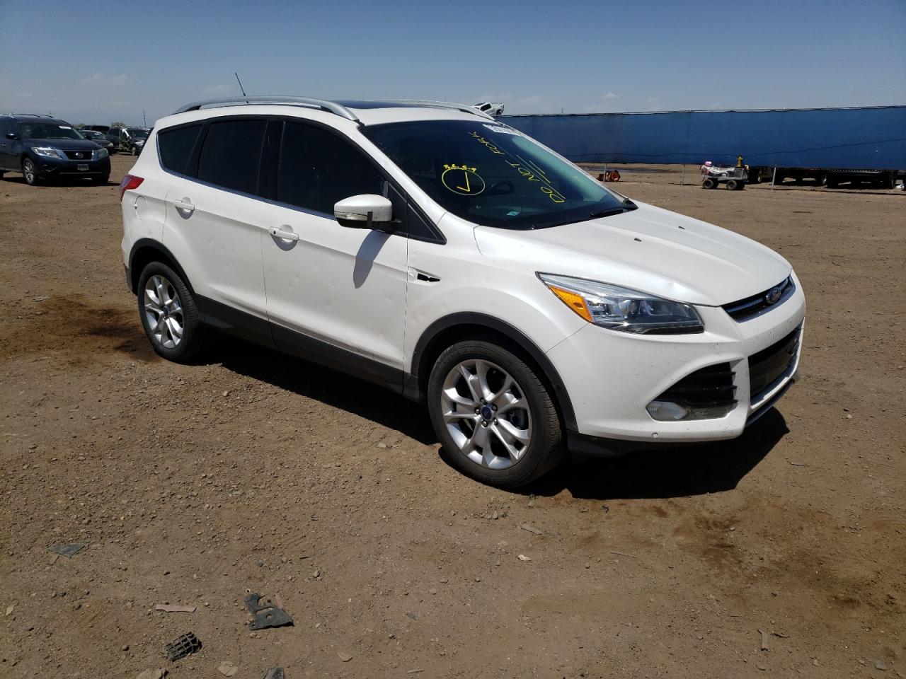 FORD ESCAPE TIT 2015 with VIN 1FMCU9J90FUC77327 - Photo from auction