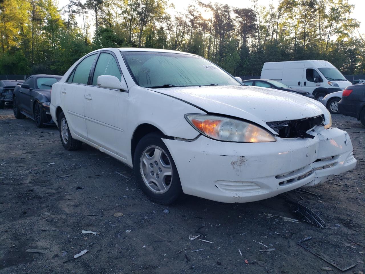 TOYOTA CAMRY LE 2002 with VIN 4T1BF32K72U025122 - Photo from auction