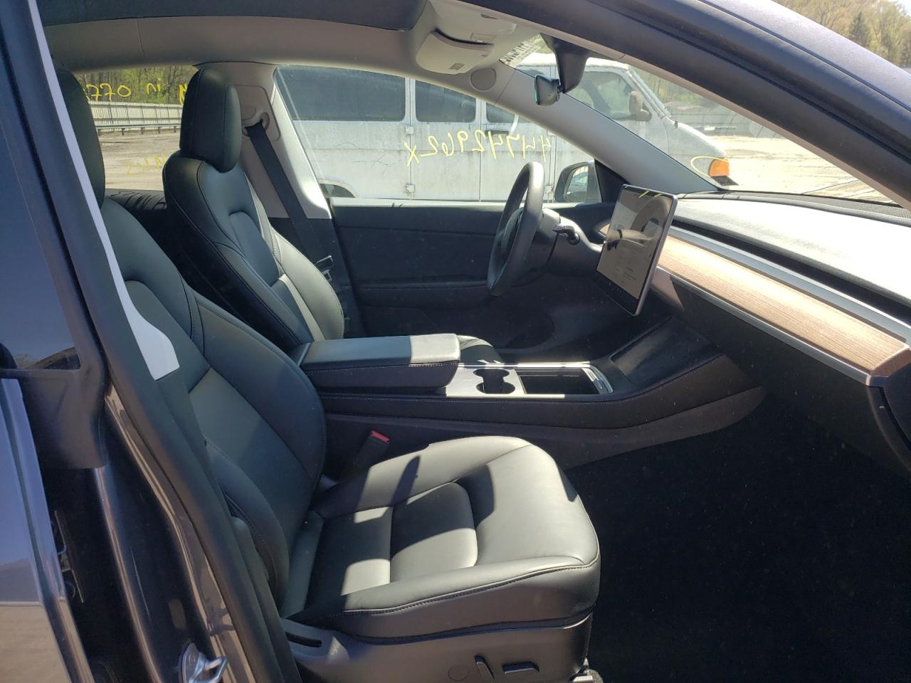 Photo 14 from auction – 2021 TESLA MODEL Y with VIN 5YJYGDEE3MF241035