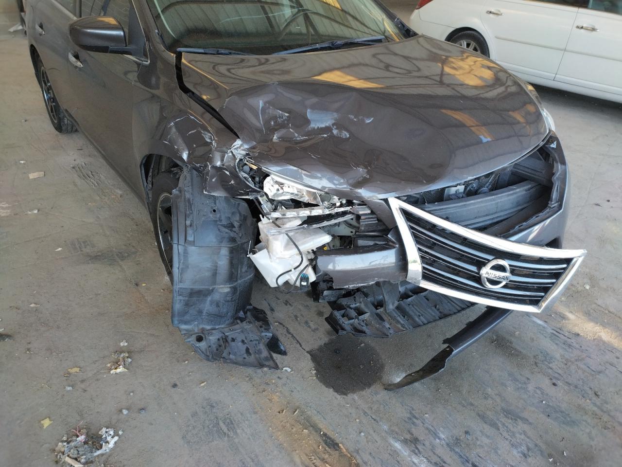 Photo 9 from auction – 2015 NISSAN SENTRA S with VIN 3N1AB7AP4FL690563