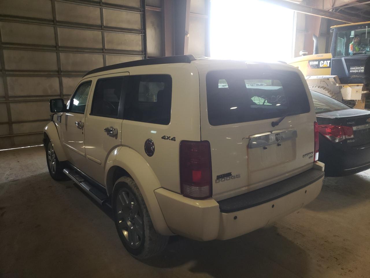 Photo 3 from auction – 2010 DODGE NITRO SXT with VIN 1D4PU5GK9AW118427