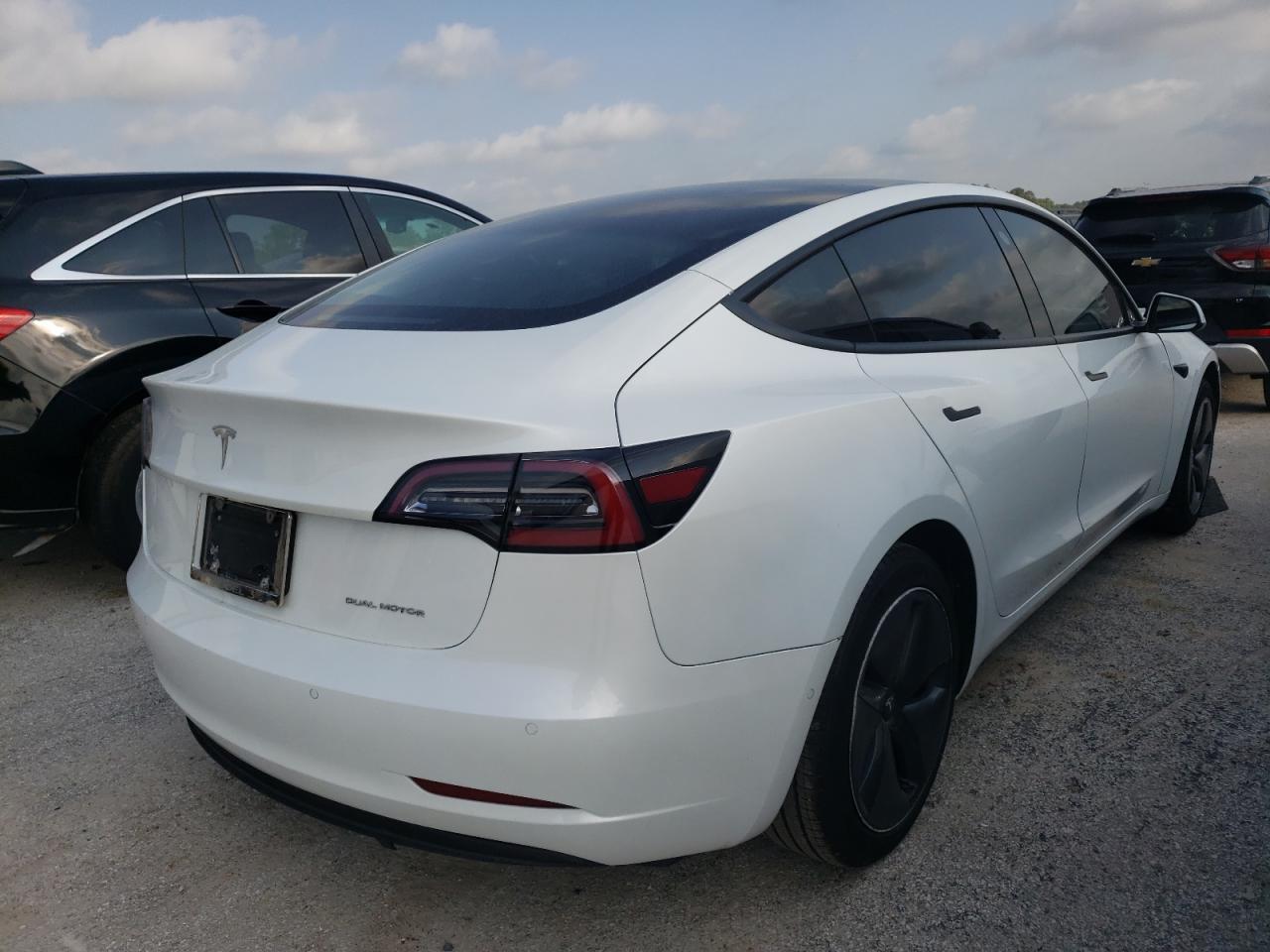 Photo 4 from auction – 2021 TESLA MODEL 3 with VIN 5YJ3E1EA8MF848270