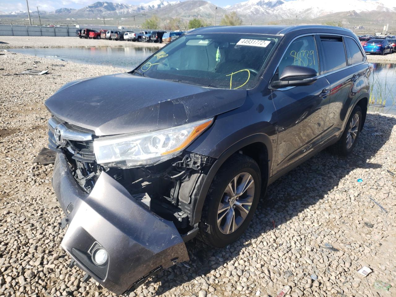 Photo 2 from auction – 2014 TOYOTA HIGHLANDER with VIN 5TDJKRFH4ES041056