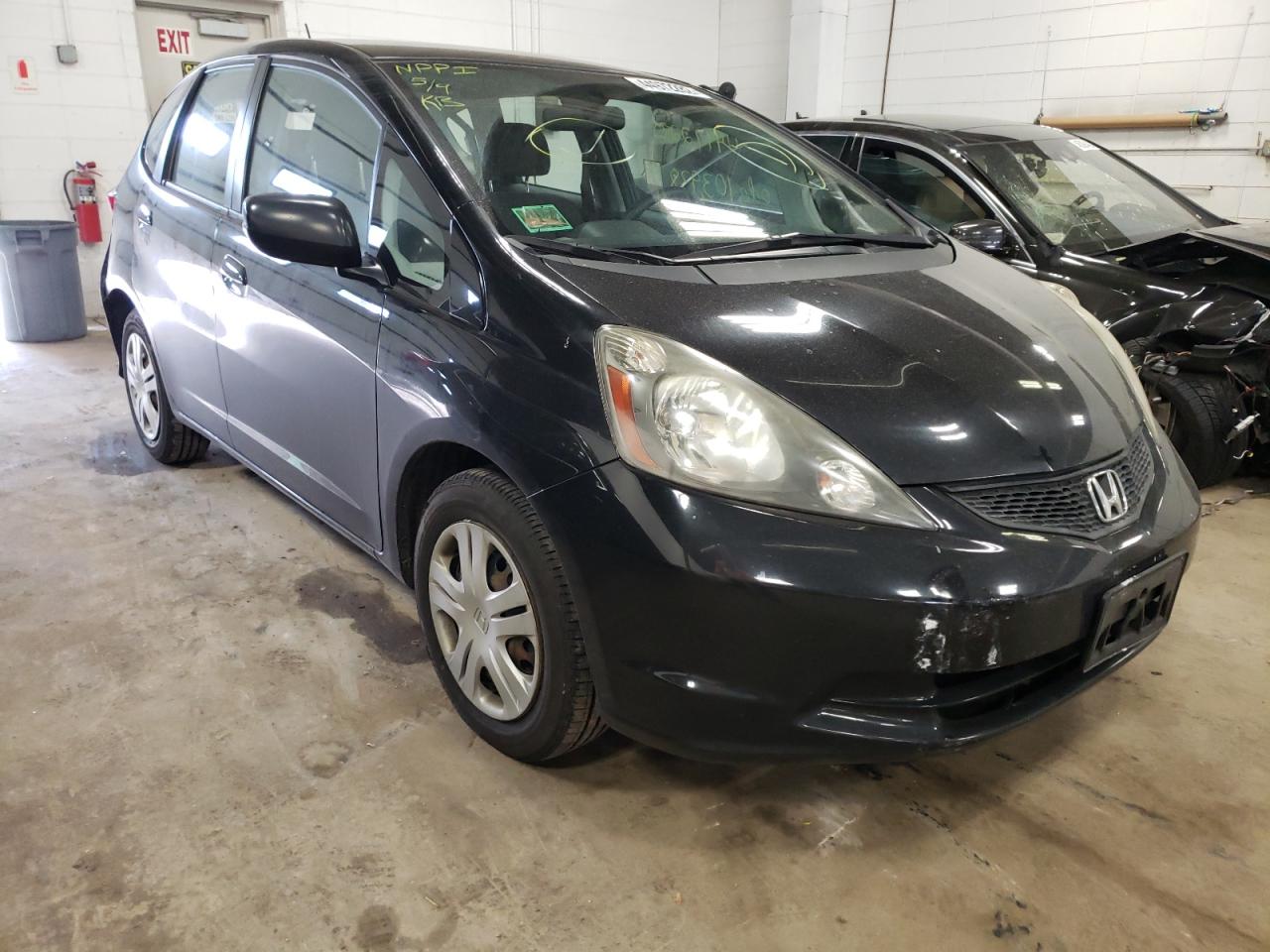 HONDA FIT 2011 with VIN JHMGE8H33BS011027 - Photo from auction