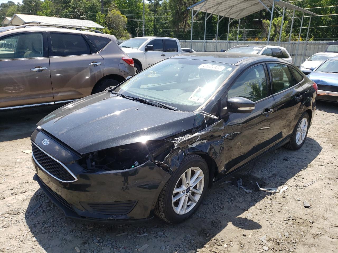Photo 14 from auction – 2015 FORD FOCUS SE with VIN 1FADP3F20FL347316