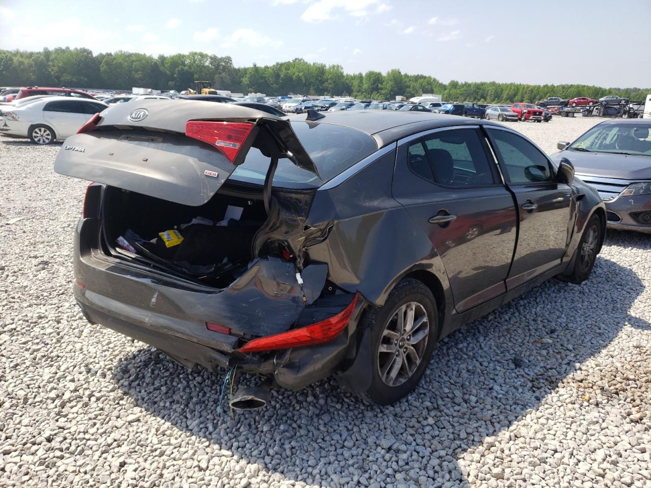 Photo 16 from auction – 2011 KIA OPTIMA LX with VIN KNAGM4A79B5163996