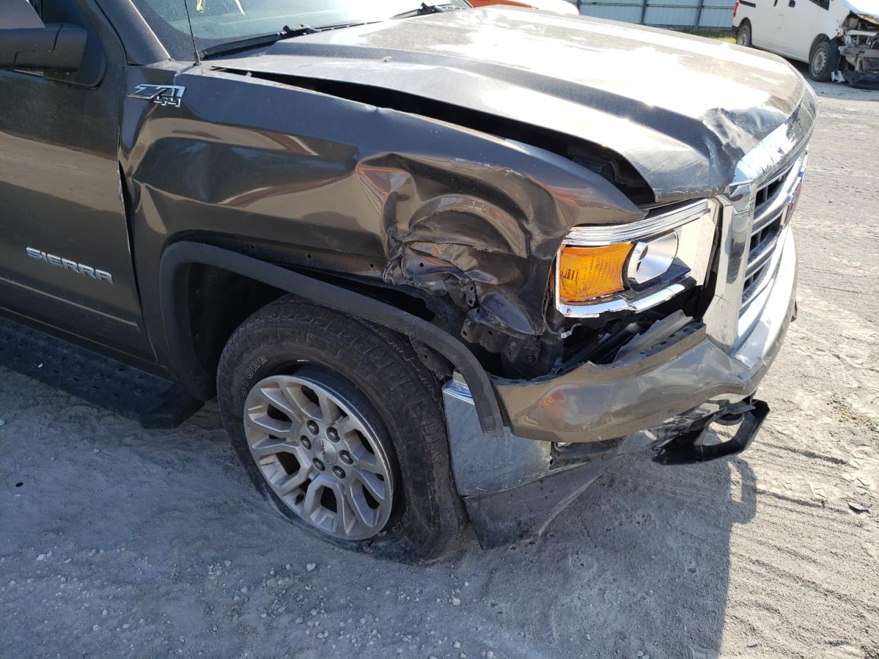 Photo 9 from auction – 2015 GMC SIERRA K15 with VIN 3GTU2UEC6FG110545