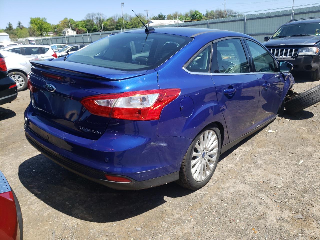 Photo 4 from auction – 2012 FORD FOCUS TITA with VIN 1FAHP3J20CL413044